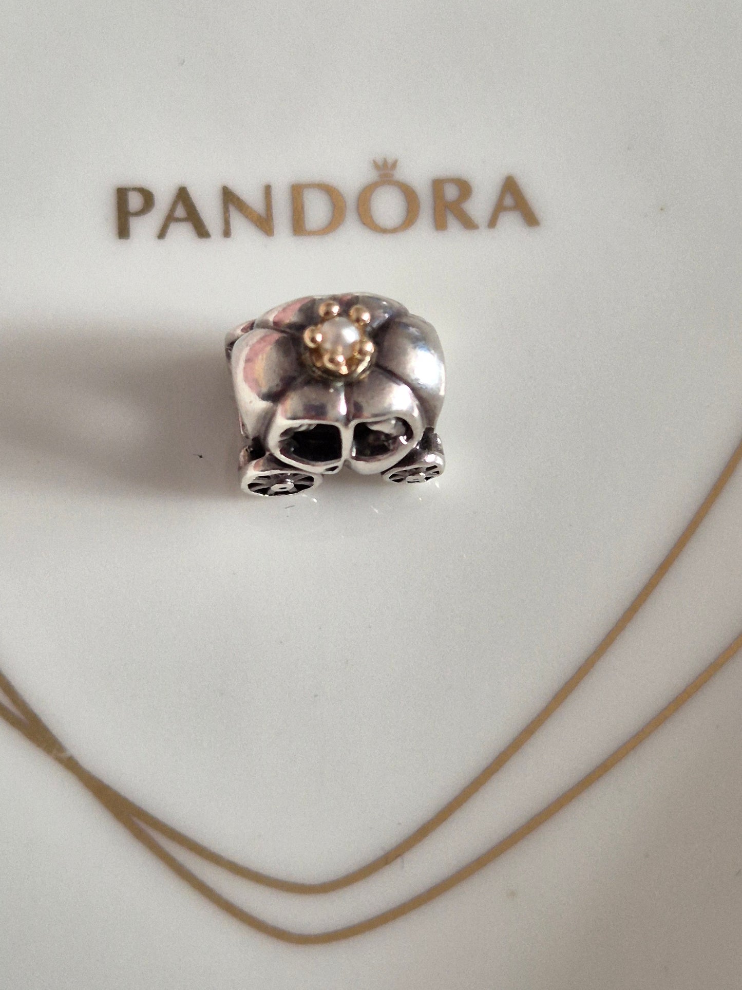 Pandora carriage charm with 14ct gold top