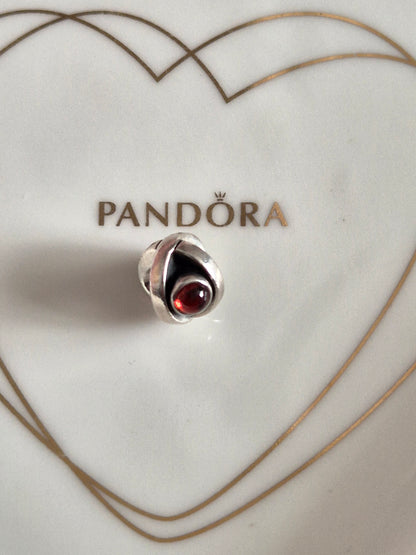 Pandora garnet eye charm