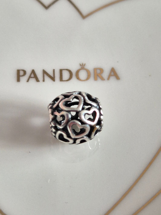 Pandora ball of hearts charm